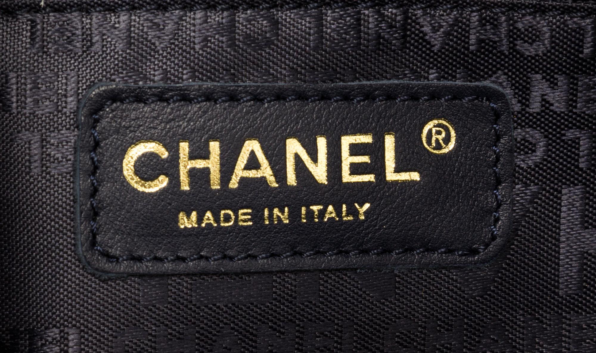 A Chanel Blue Suede Quilted Bowling Bag, 11" x 6.5" x 4.5".