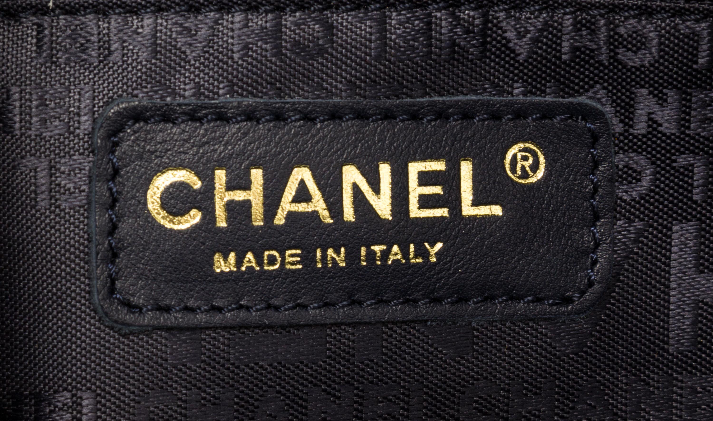 A Chanel Blue Suede Quilted Bowling Bag, 11" x 6.5" x 4.5".