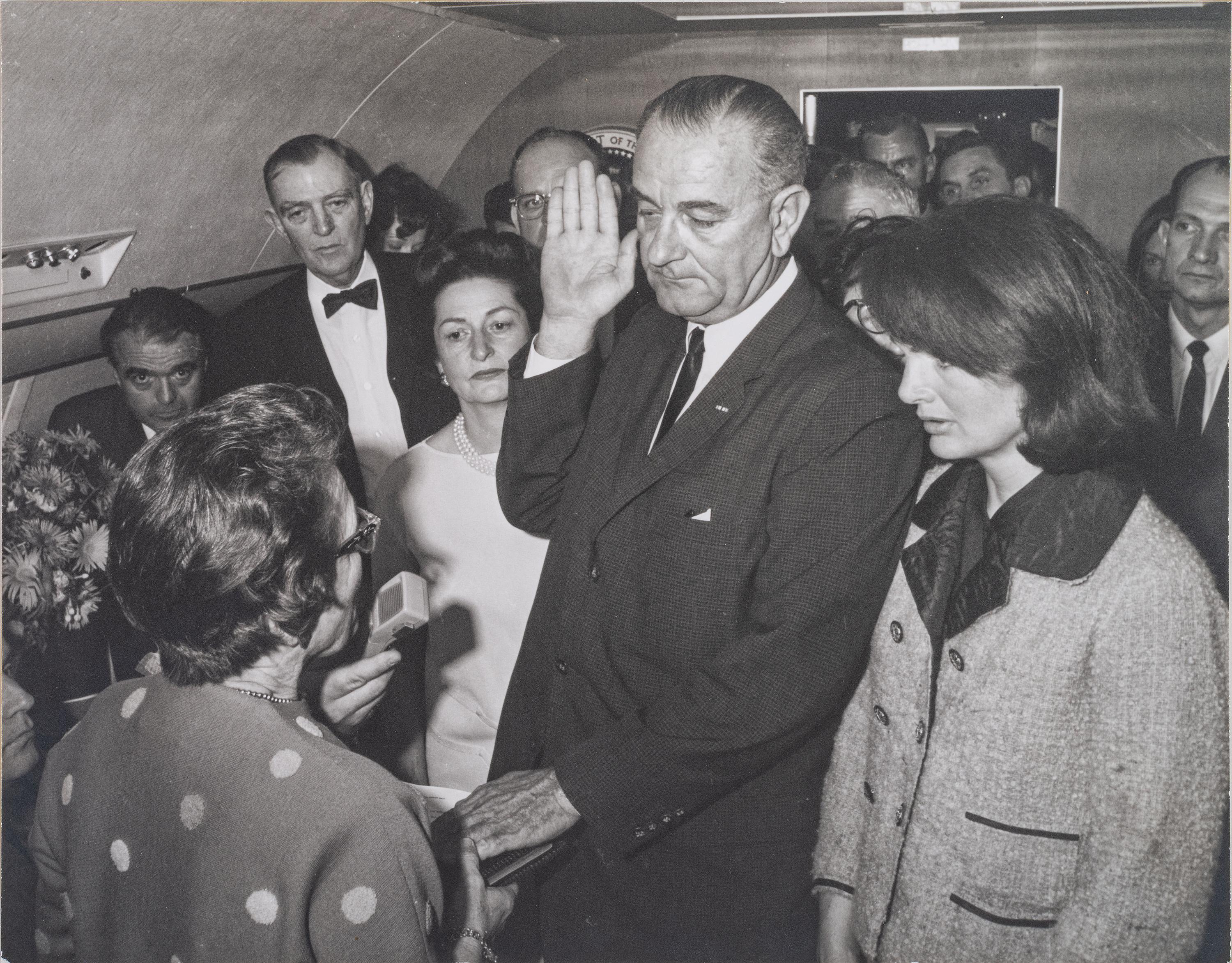 [POLITICS]. STOUGHTON, Cecil (1920-2008), photographer. Photograph of Lyndon B. Johnson's swearing-in aboard Air Force One.