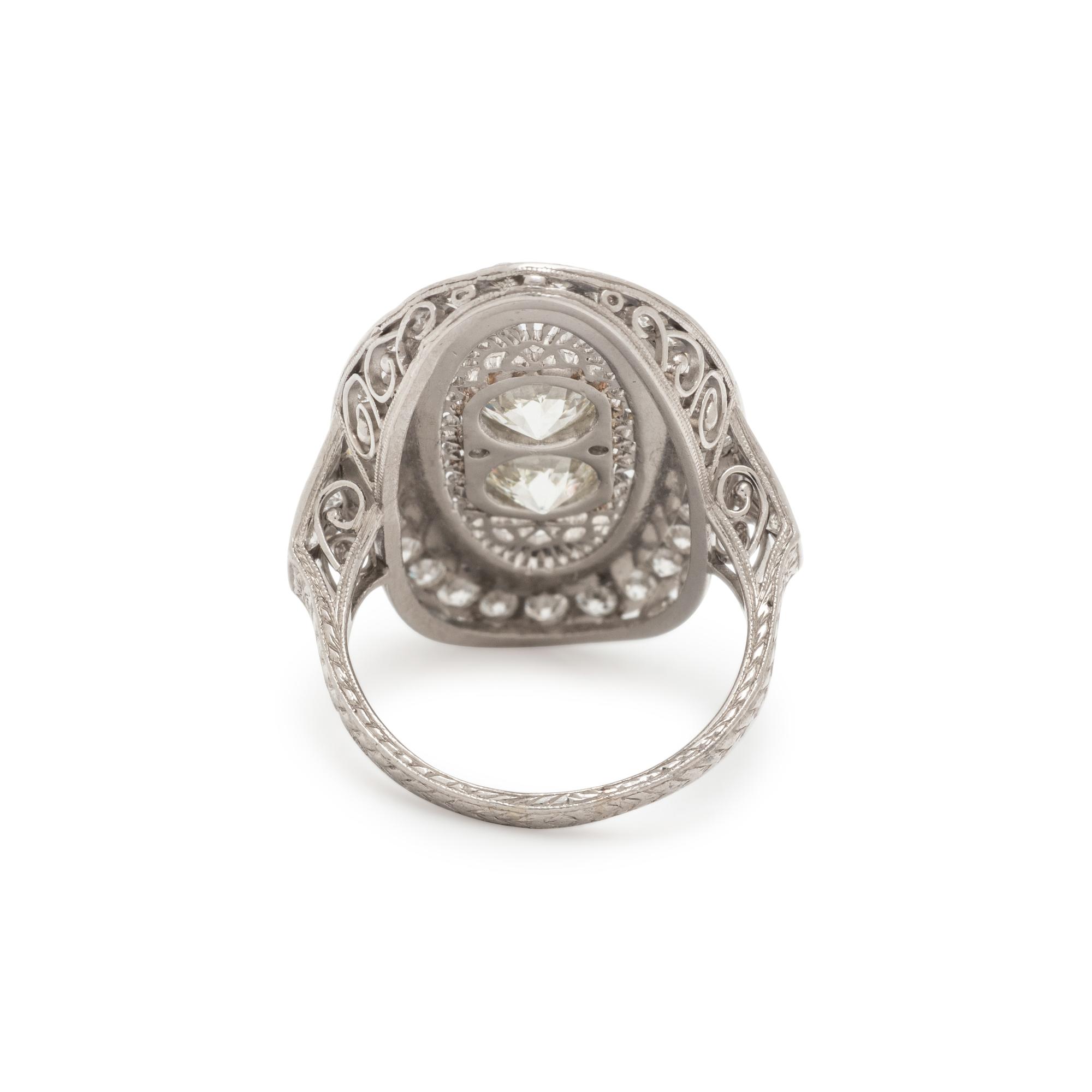 ONYX, DIAMOND, AND PLATINUM RING