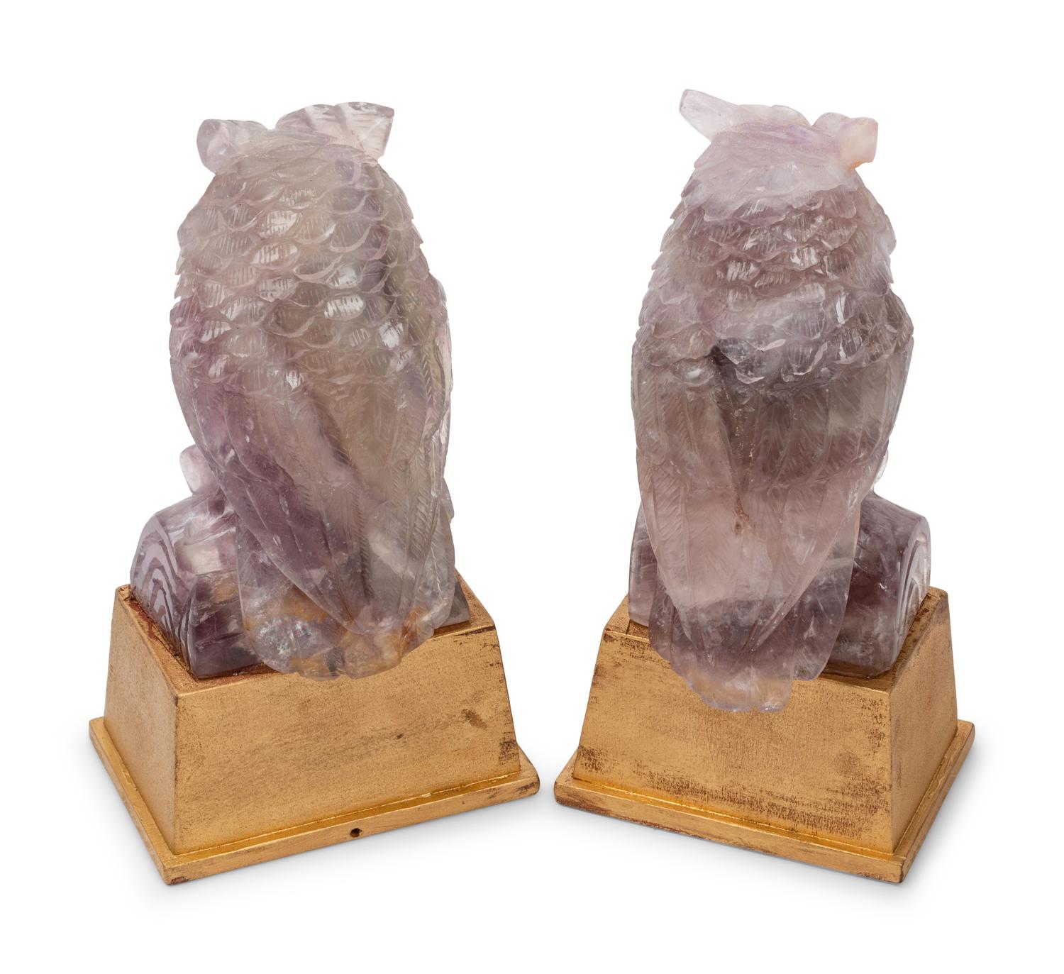 A Pair of Carved Amethyst Owls with Carved Wood Bases
