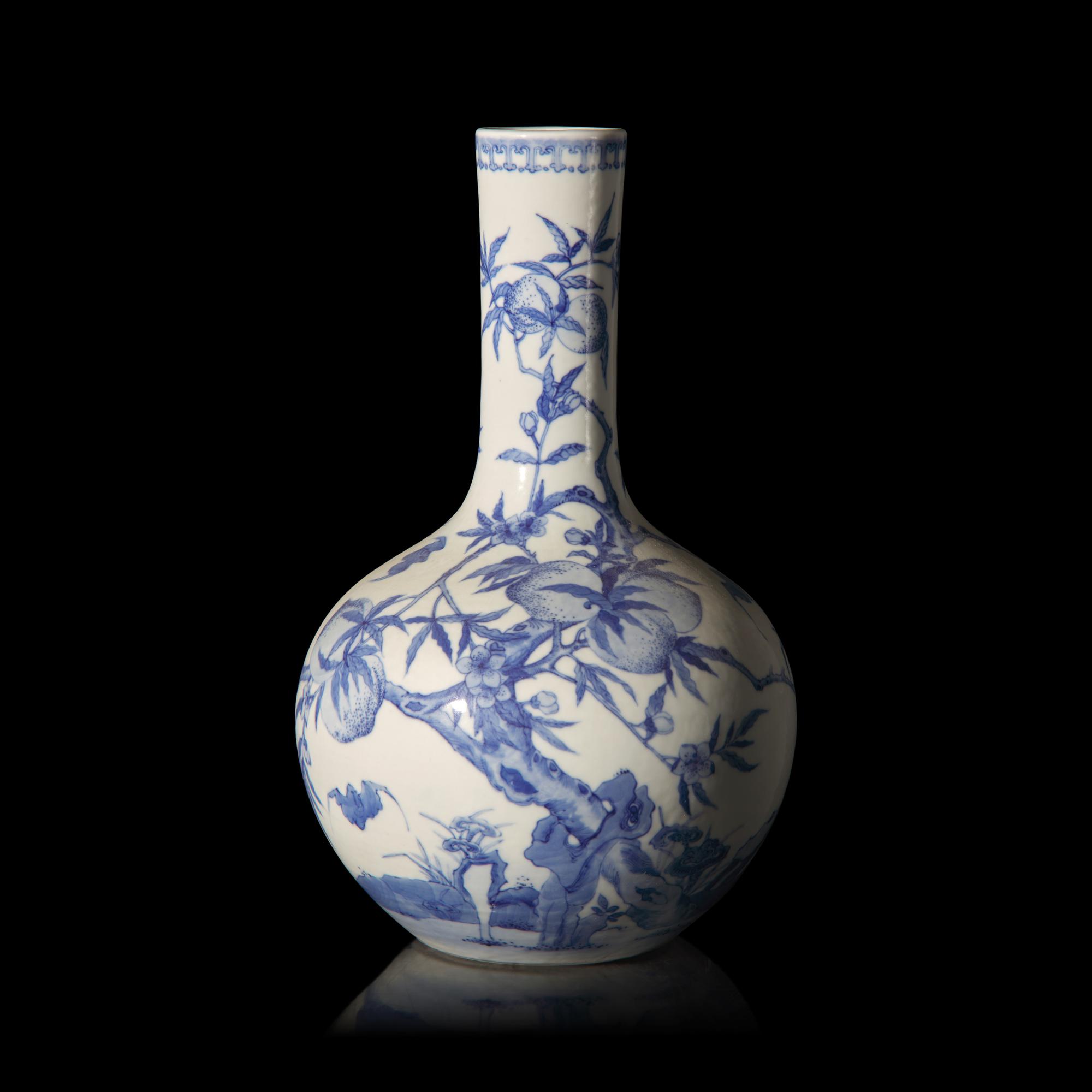 A Chinese Blue and White "Peaches and Bats" Bottle Vase, Tianqiuping , 20th Century 近代 青花福桃紋天球瓶