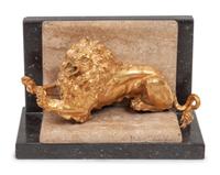 A Gilt Bronze and Limestone Lion Bookend