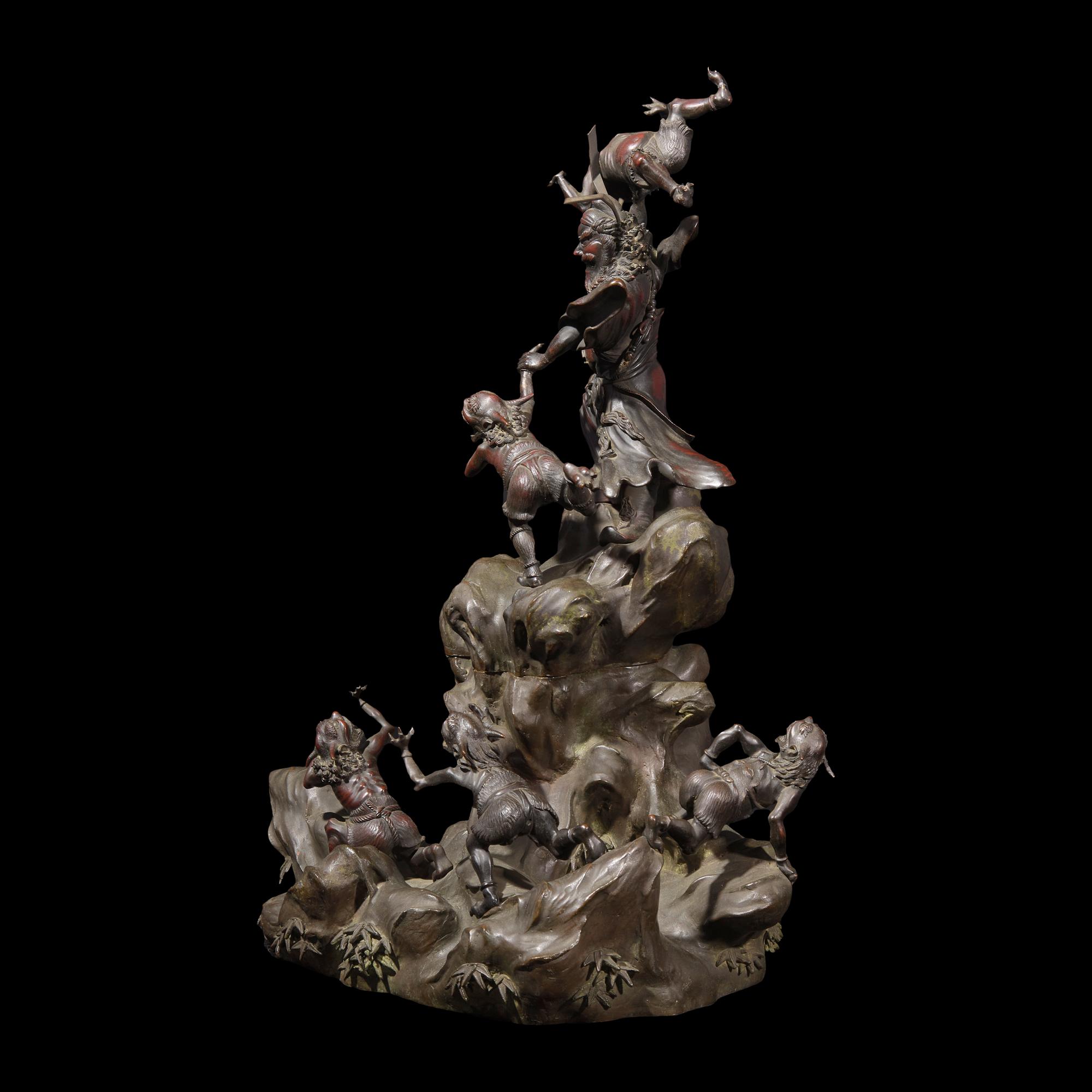 A Japanese Patinated Bronze and Metal S hoki and Oni Figural Koro, Meiji Period 日本明治時代 銅雕鍾馗捉鬼