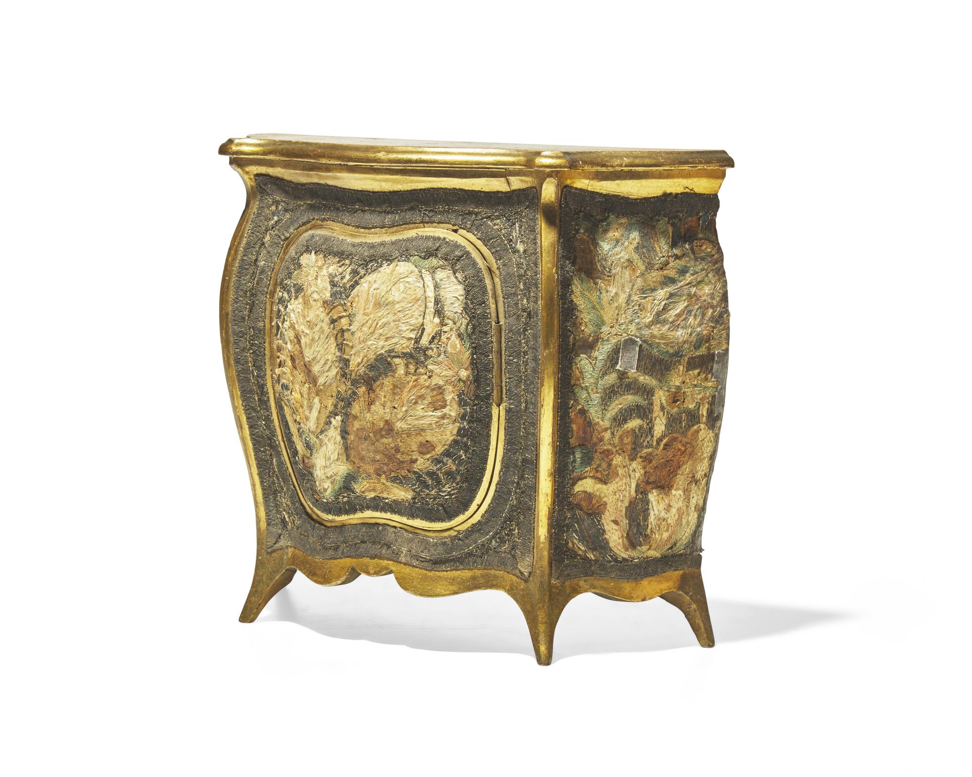 A miniature Continental giltwood and featherwork-mounted bombé commode, 18th / 19th century