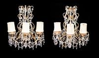 APPROVED FOR DONATION A Pair of Continental Giltwood and Cut Glass Three-Light Sconces