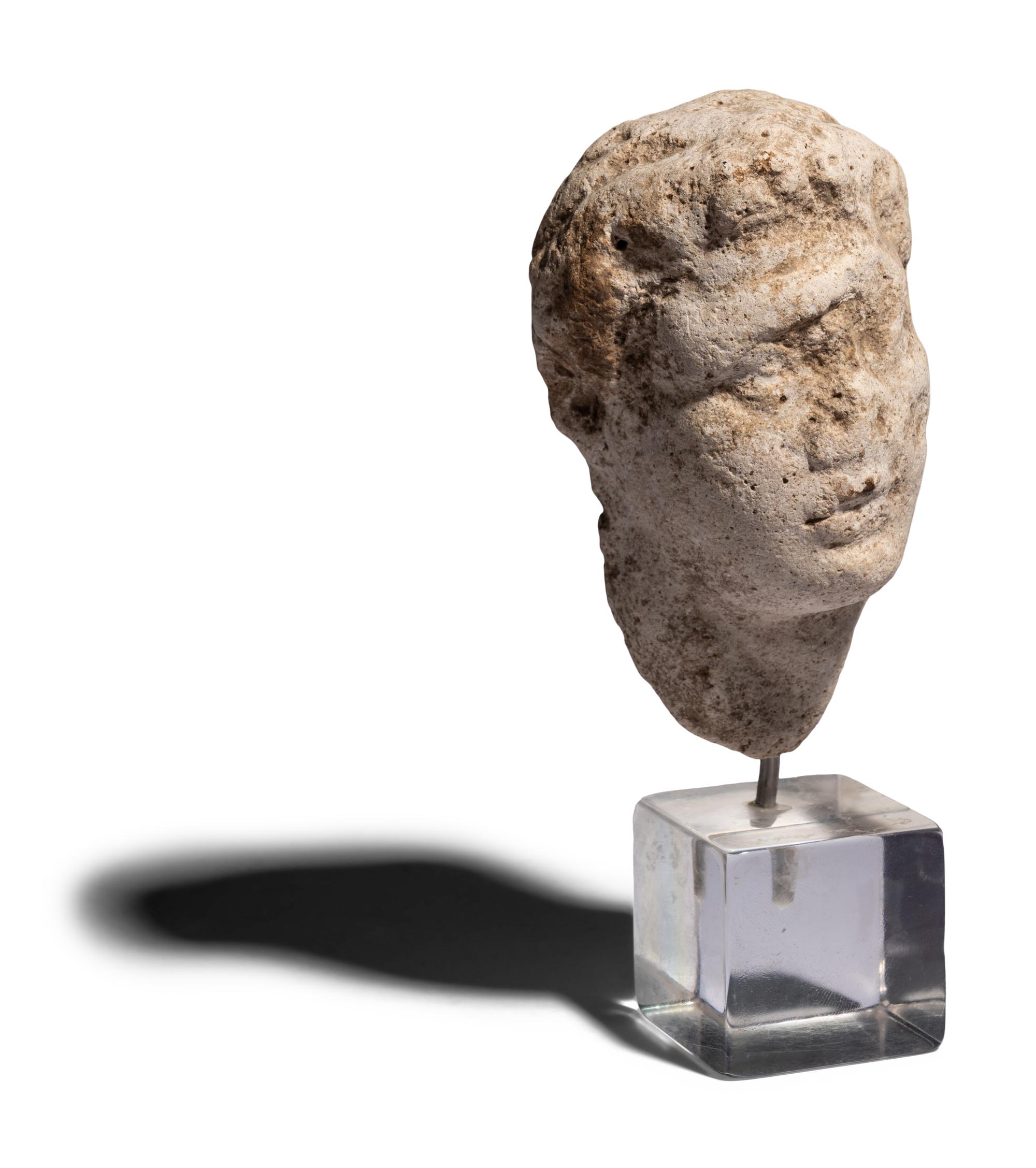 A Roman Marble Head of a Youth
