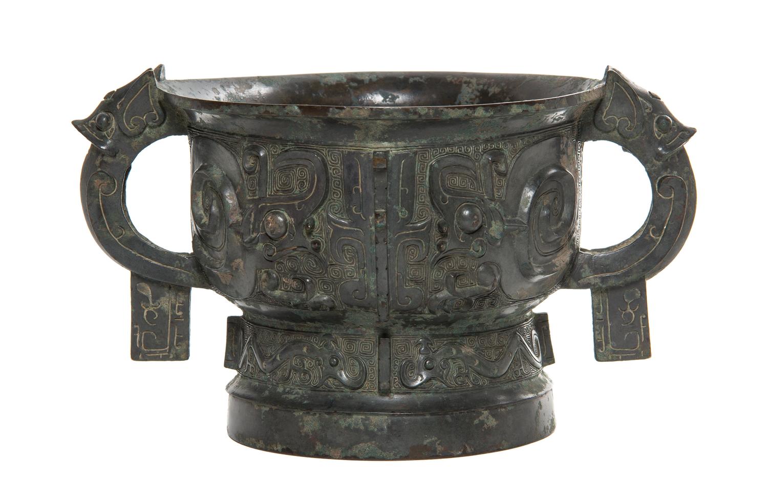 A Bronze Ritual Gui Vessel Width over handles 10 5/8 inches.