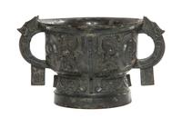A Bronze Ritual Gui Vessel Width over handles 10 5/8 inches.