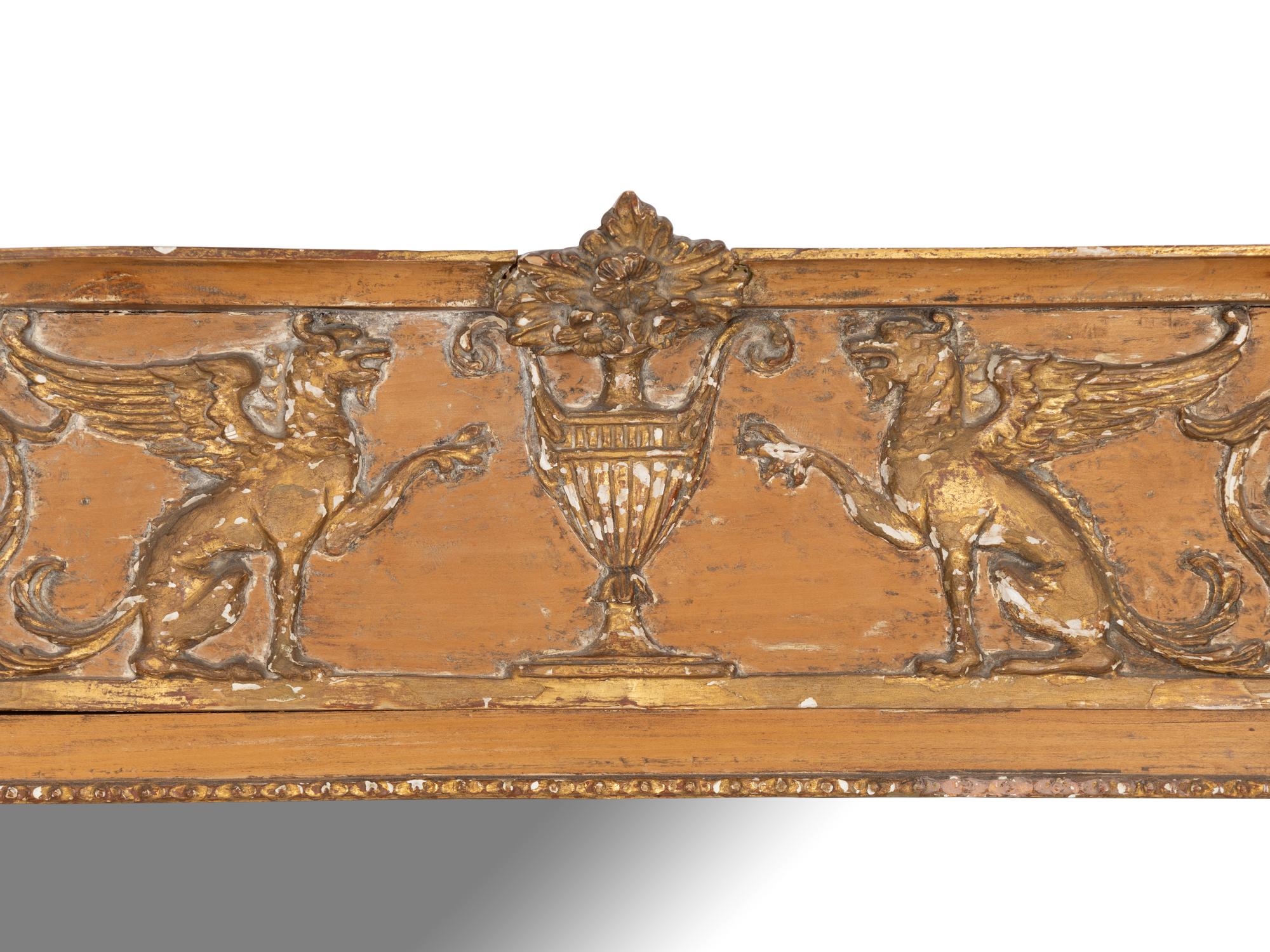An Empire Style Parcel Gilt Overmantel Mirror with Frieze Relief