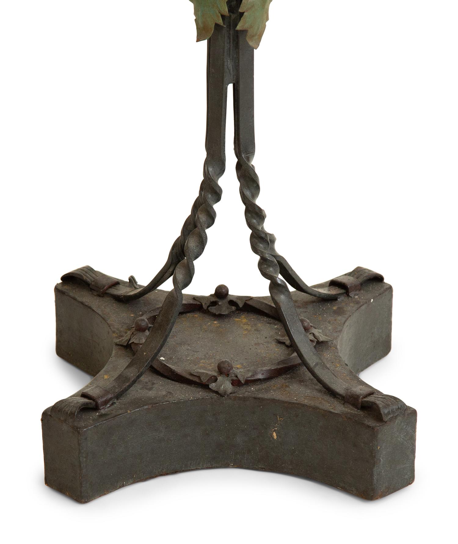 A Mizner Style Painted Tole and Wrought Iron Five-Light Torchère