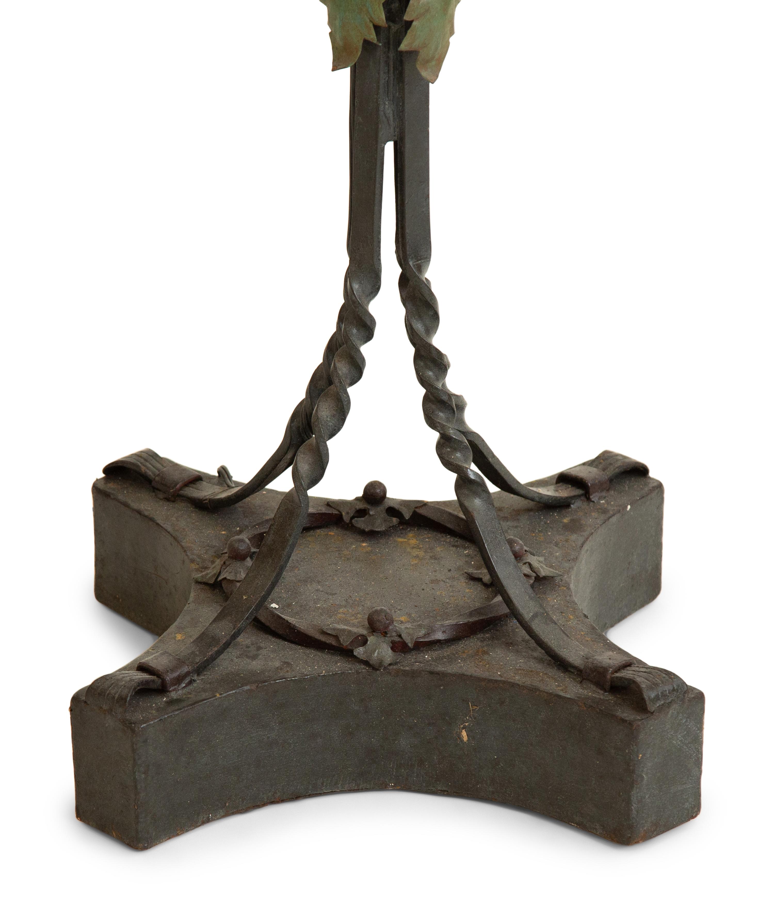 A Mizner Style Painted Tole and Wrought Iron Five-Light Torchère