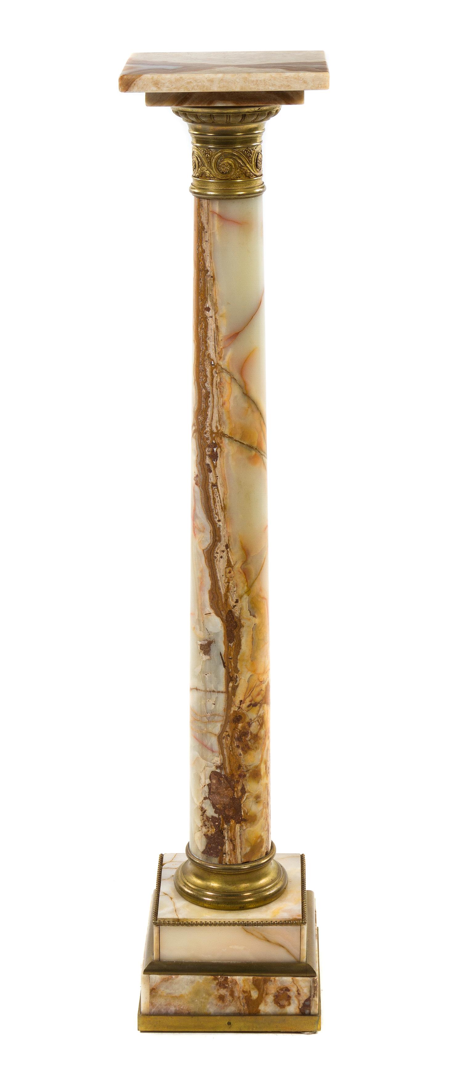 A Continental Gilt Metal Mounted Beige Marble Pedestal, Height 46 x width 9 1/4 x depth 9 1/4 inches.
