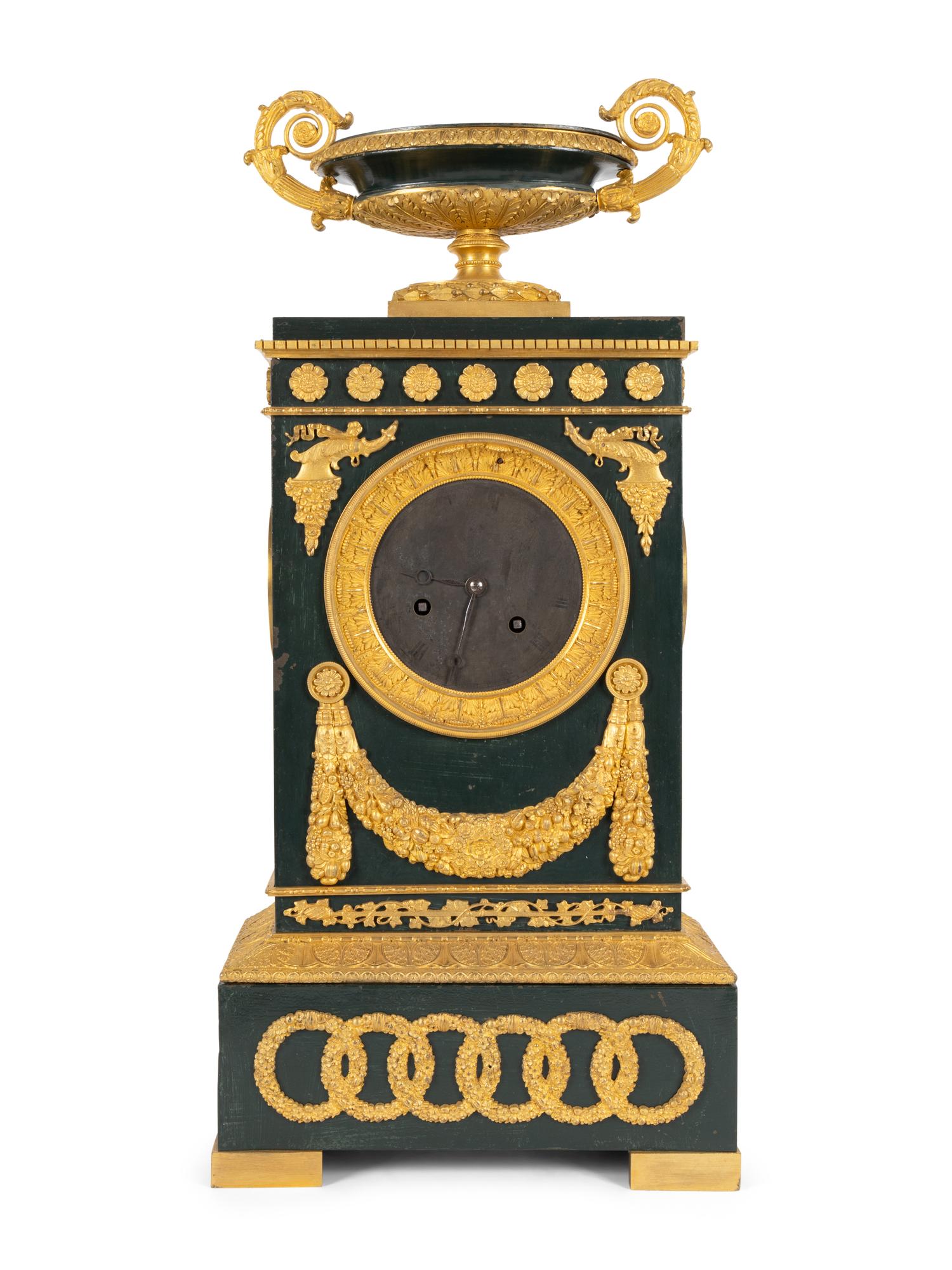 An Empire Gilt Bronze and Tôle Peinte Mantel Clock