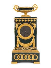 An Empire Gilt Bronze and Tôle Peinte Mantel Clock