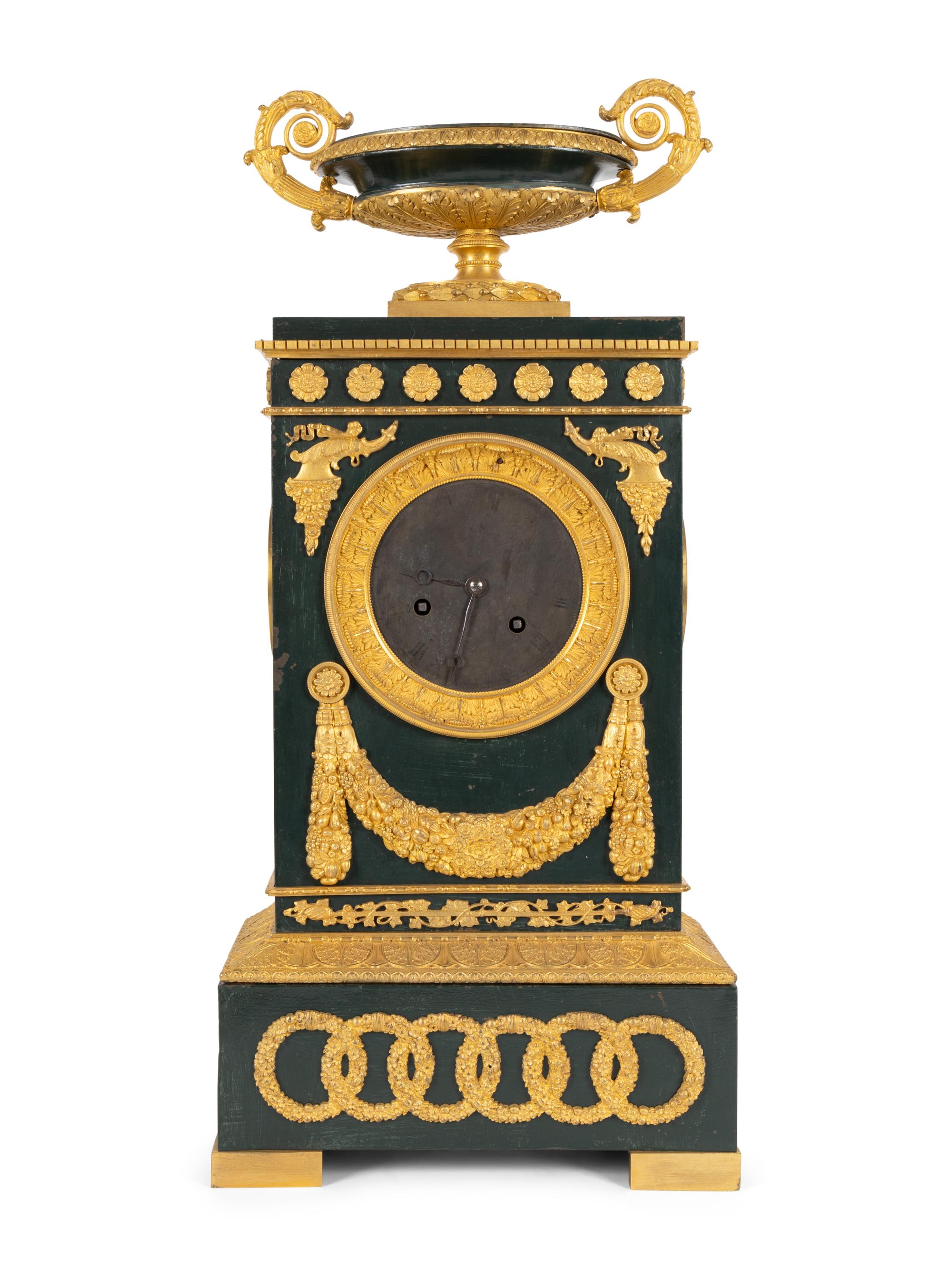 An Empire Gilt Bronze and Tôle Peinte Mantel Clock