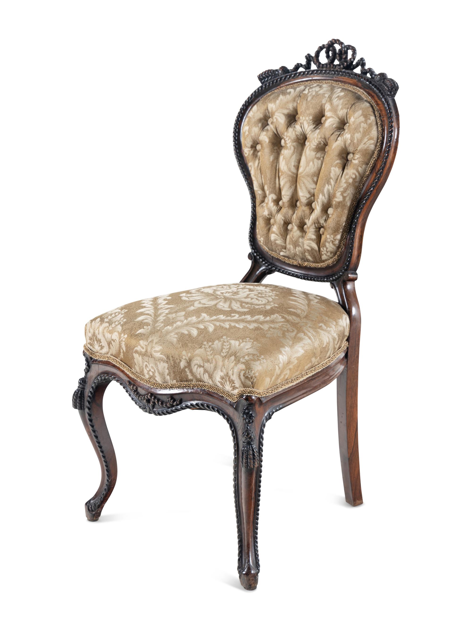 A Set of Four Rococo Revival Carved Balloon-Back Side Chairs