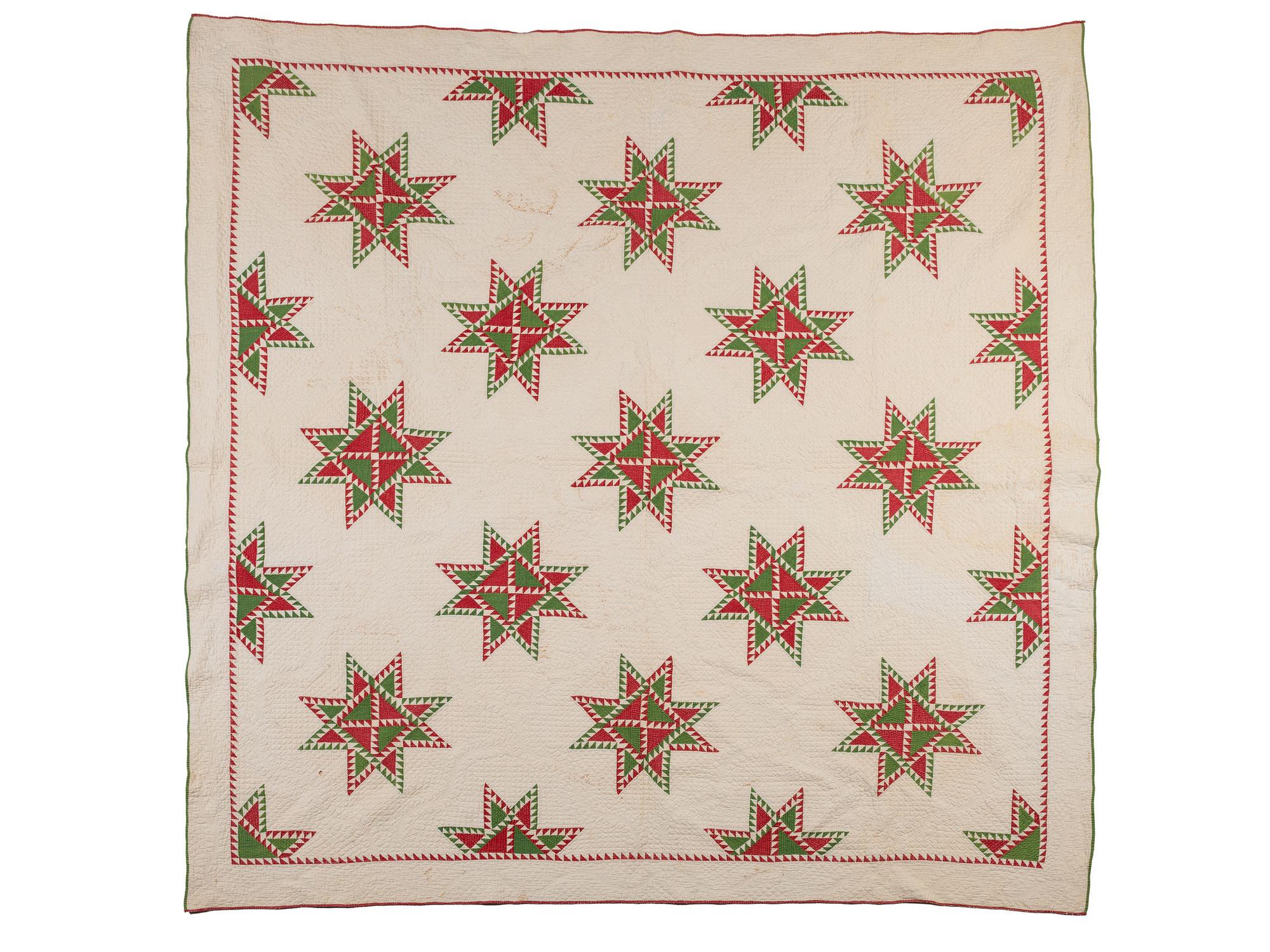 A Hand-Sewn Red and Green "Star" Pattern Quilt