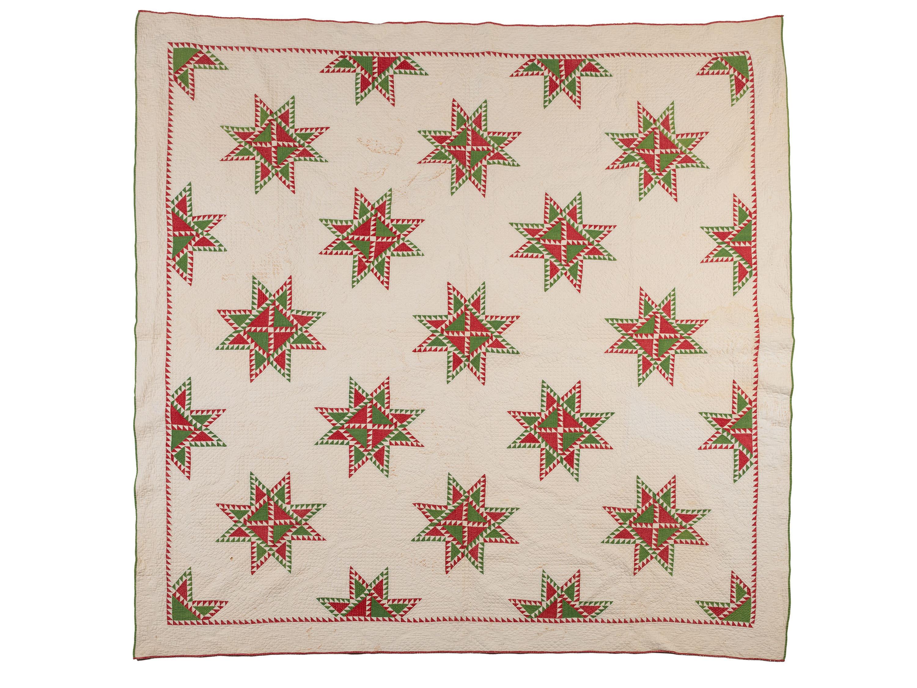 A Hand-Sewn Red and Green "Star" Pattern Quilt