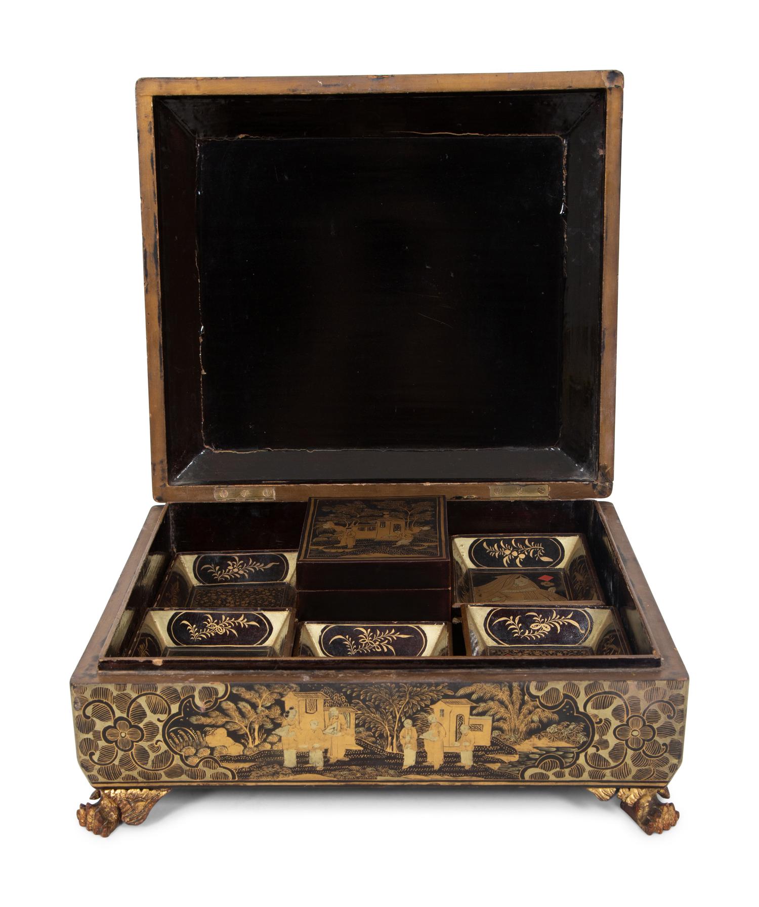 An English Chinoiserie Black and Gilt Laquer Game Box