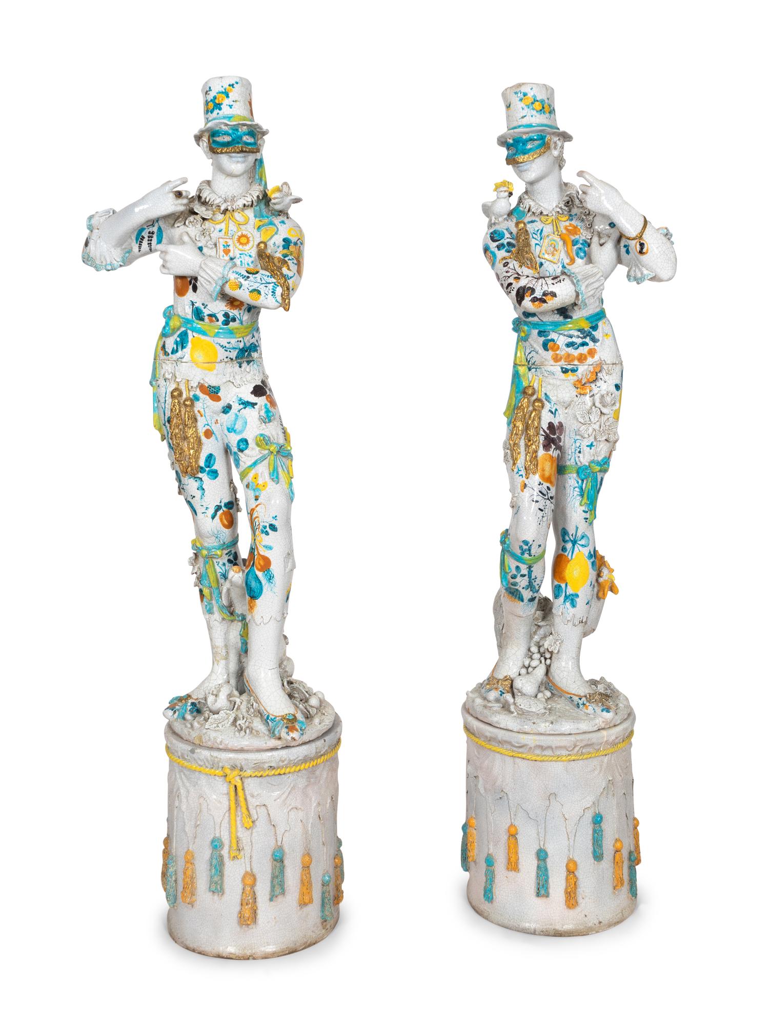 A Pair of Monumental Italian Gilt and Polychrome-Glazed Terracotta Figures of Masked Performers