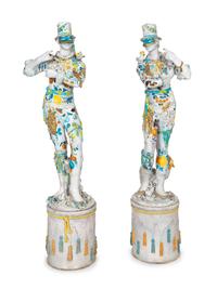 A Pair of Monumental Italian Gilt and Polychrome-Glazed Terracotta Figures of Masked Performers