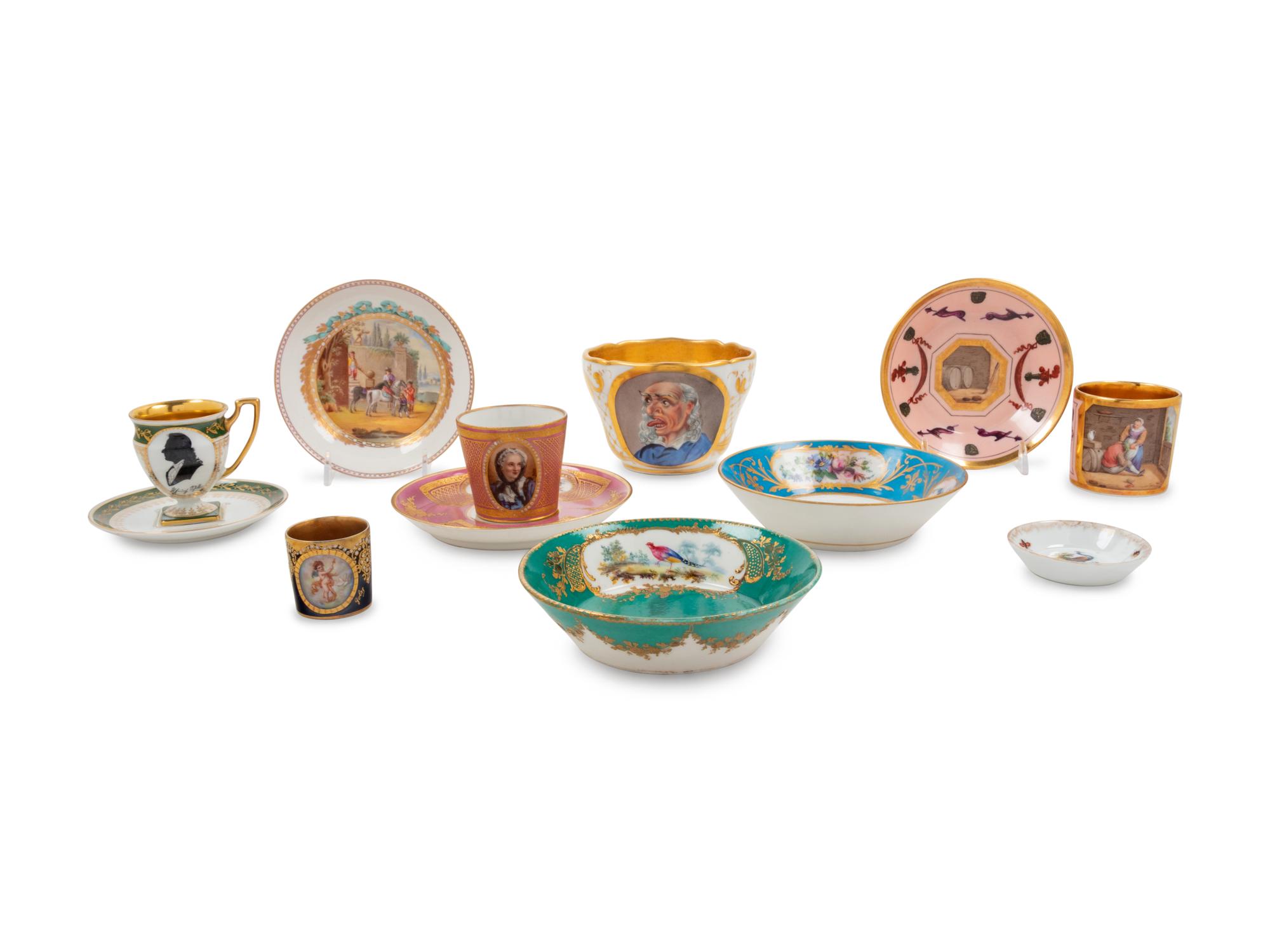 A Collection of Continental Porcelain Cups and Saucers