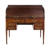 A George III Mahogany Roll Top Desk, Height 43 3/8 x width 42 1/8 x depth 28 inches. — EARLY 19TH CENTURY,