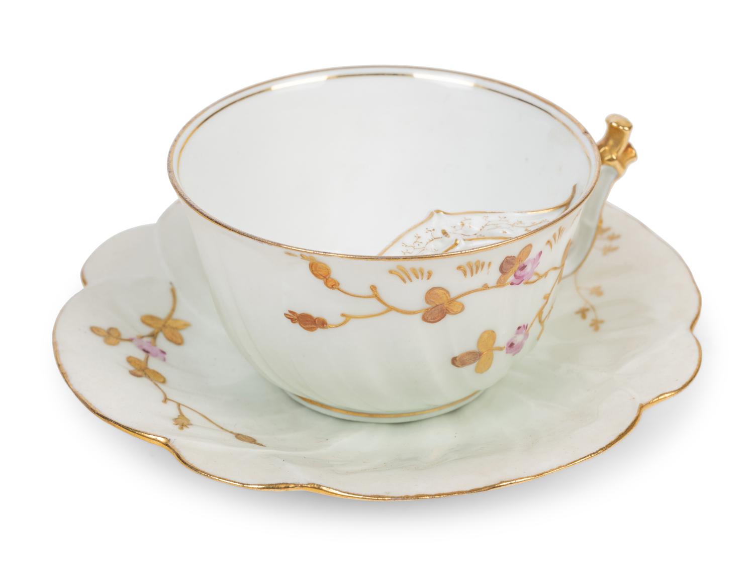 Two Continental Porcelain Moustache Cups and Saucers
