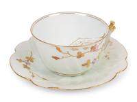 Two Continental Porcelain Moustache Cups and Saucers
