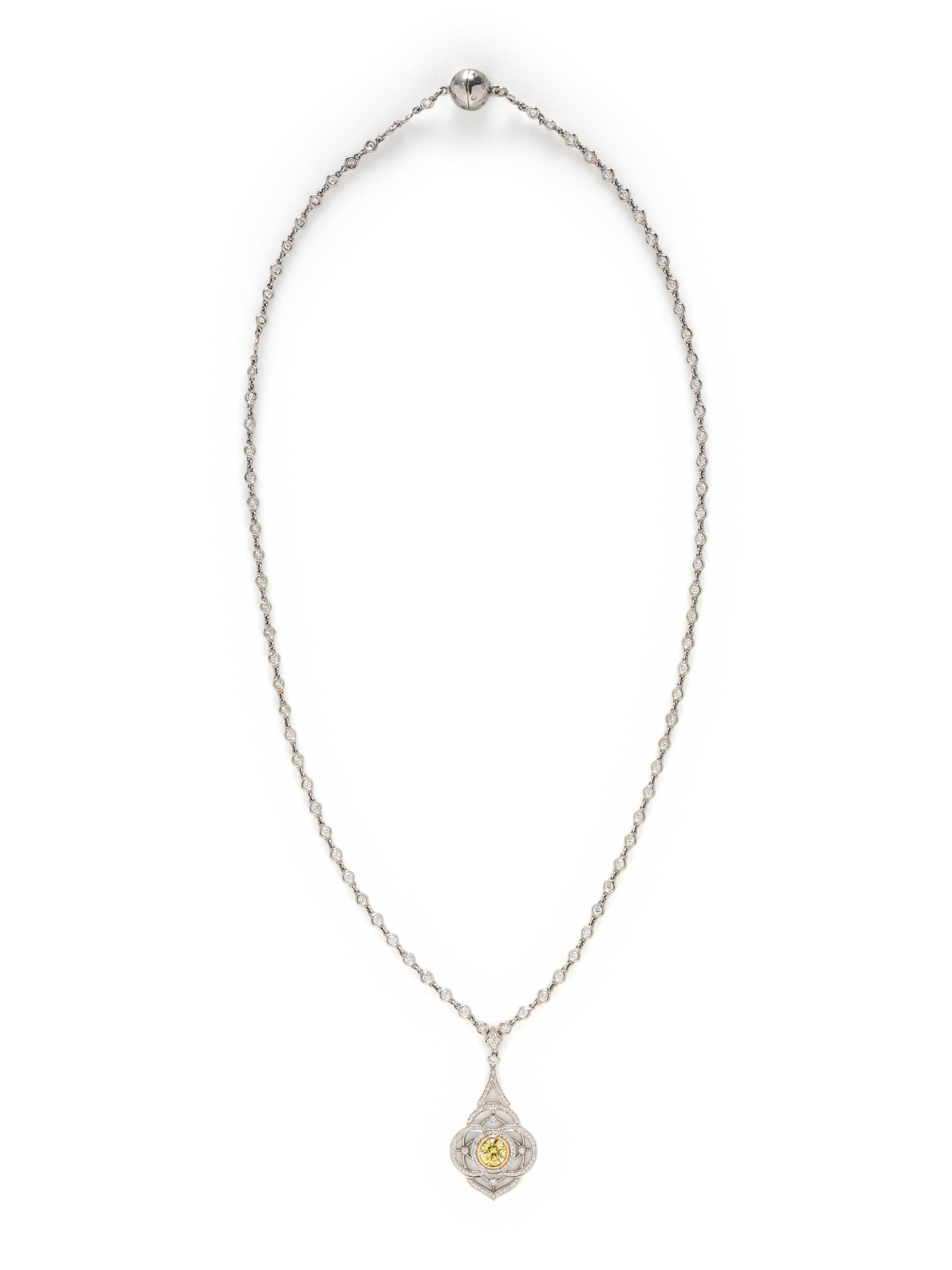 FANCY INTENSE YELLOW DIAMOND AND DIAMOND NECKLACE