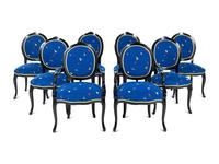 A Set of Eight Louis XV Style Ebonized Dining Chairs