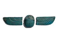 An Egyptian Faience Winged Scarab