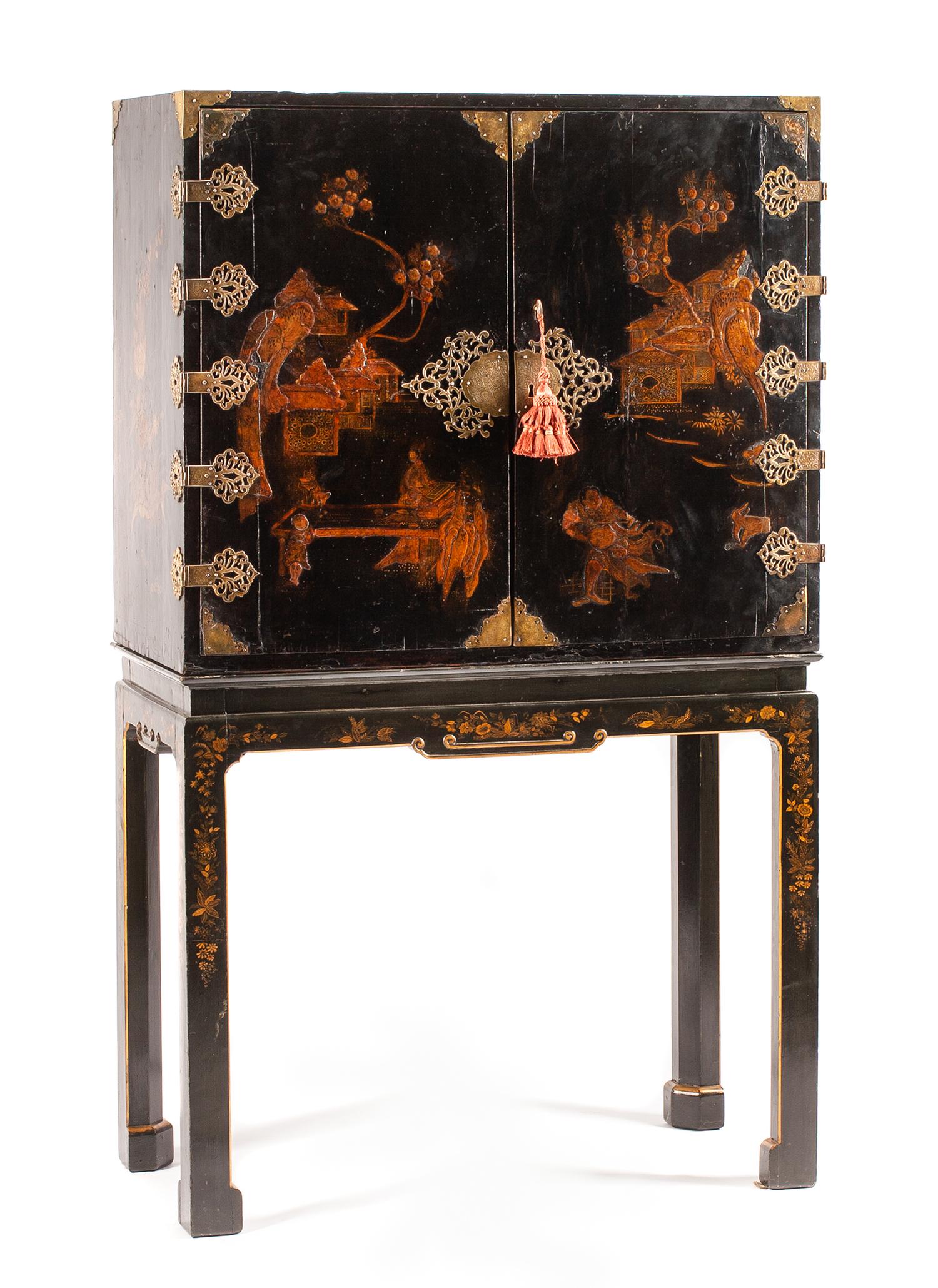 A George II Style Lacquered Cabinet on Stand Height overall 64 x width 38 x depth 19 inches. — LATE 18TH/EARLY 19TH CENTURY