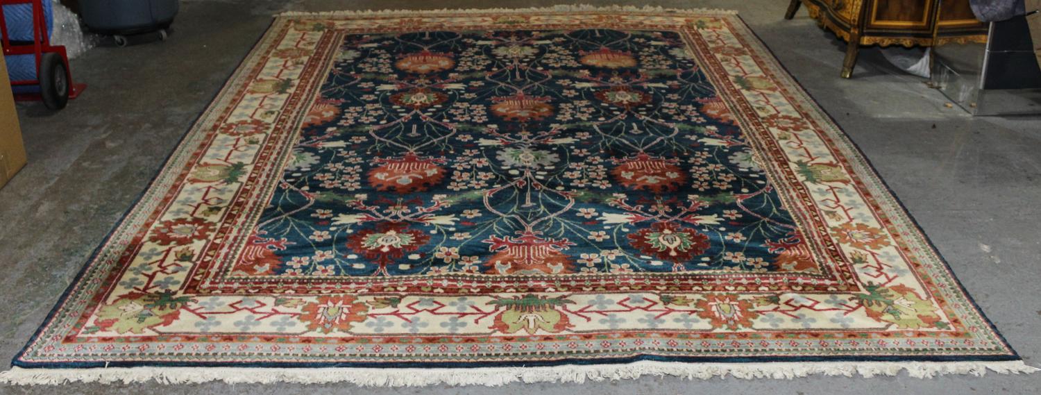 An Indo-Persian Wool Rug 11 feet 9 inches x 8 feet 11 inches. — 20TH CENTURY