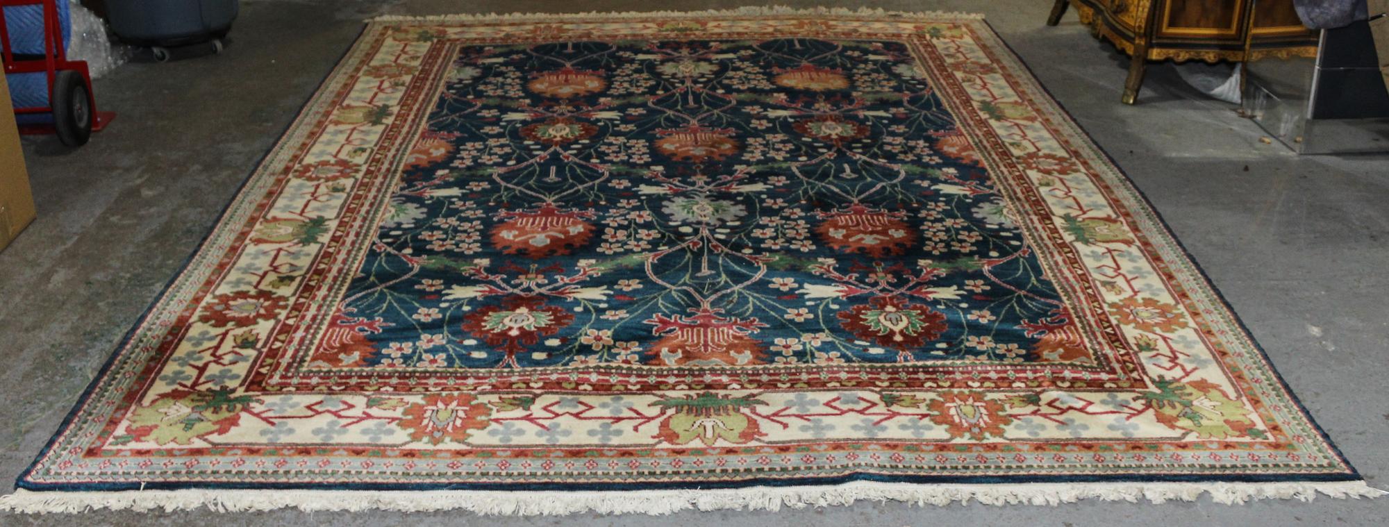 An Indo-Persian Wool Rug 11 feet 9 inches x 8 feet 11 inches. — 20TH CENTURY