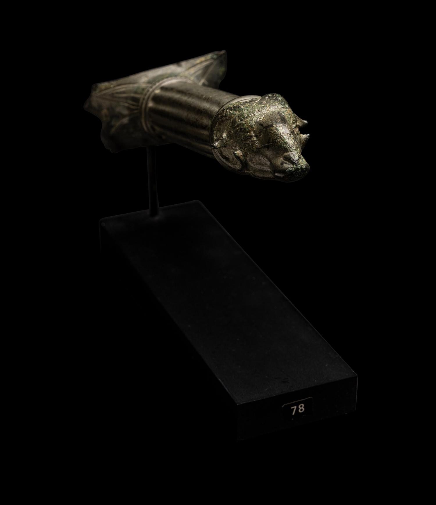 A Roman Bronze Handle with a Ram's Head