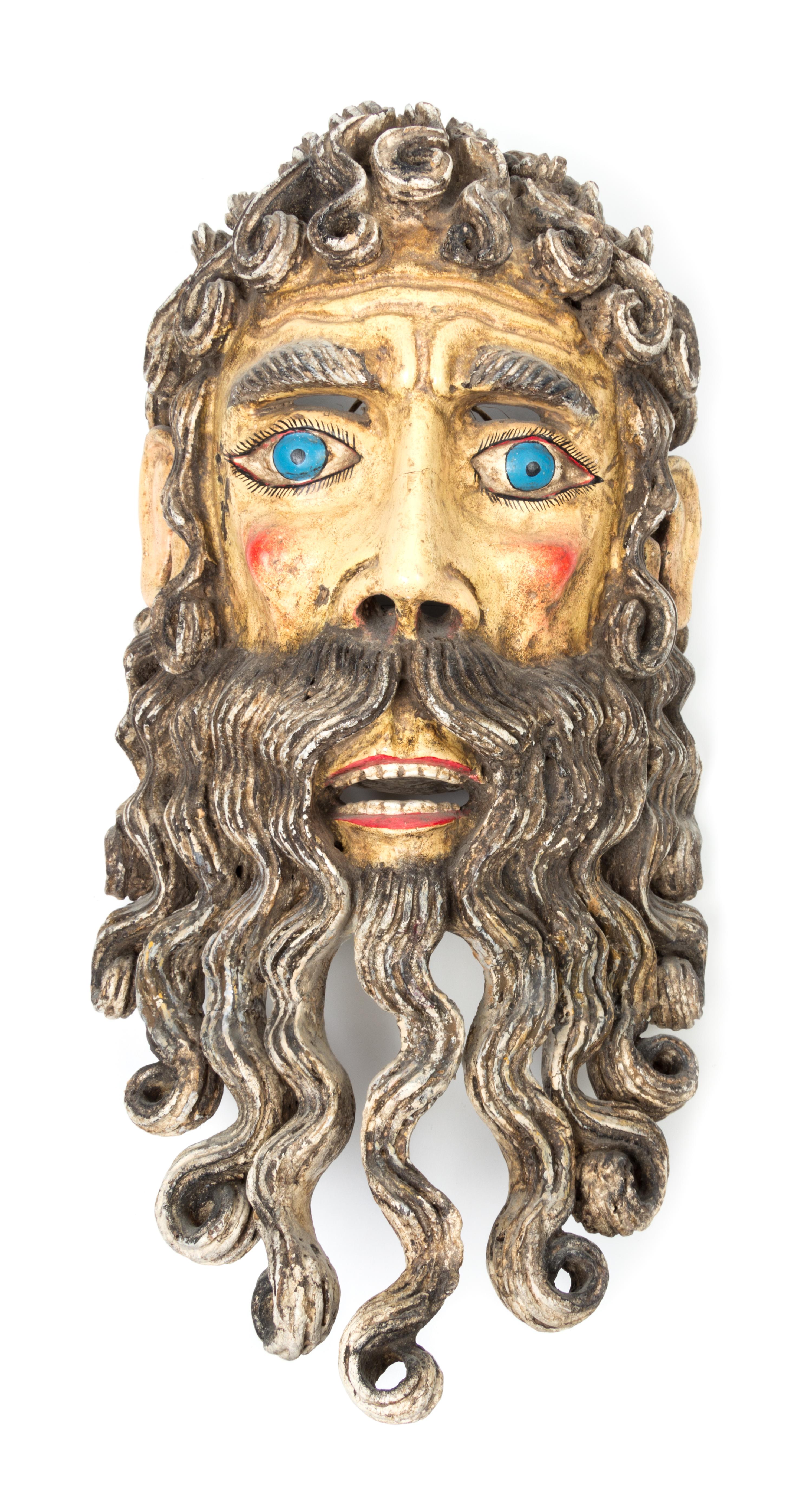 A Mexican Polychromed and Carved Wood Mask Height 17 3/4 inches