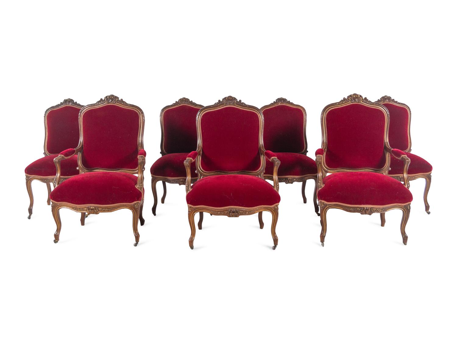 An Italian Louis XV Style Carved and Parcel Gilt Walnut Parlor Suite