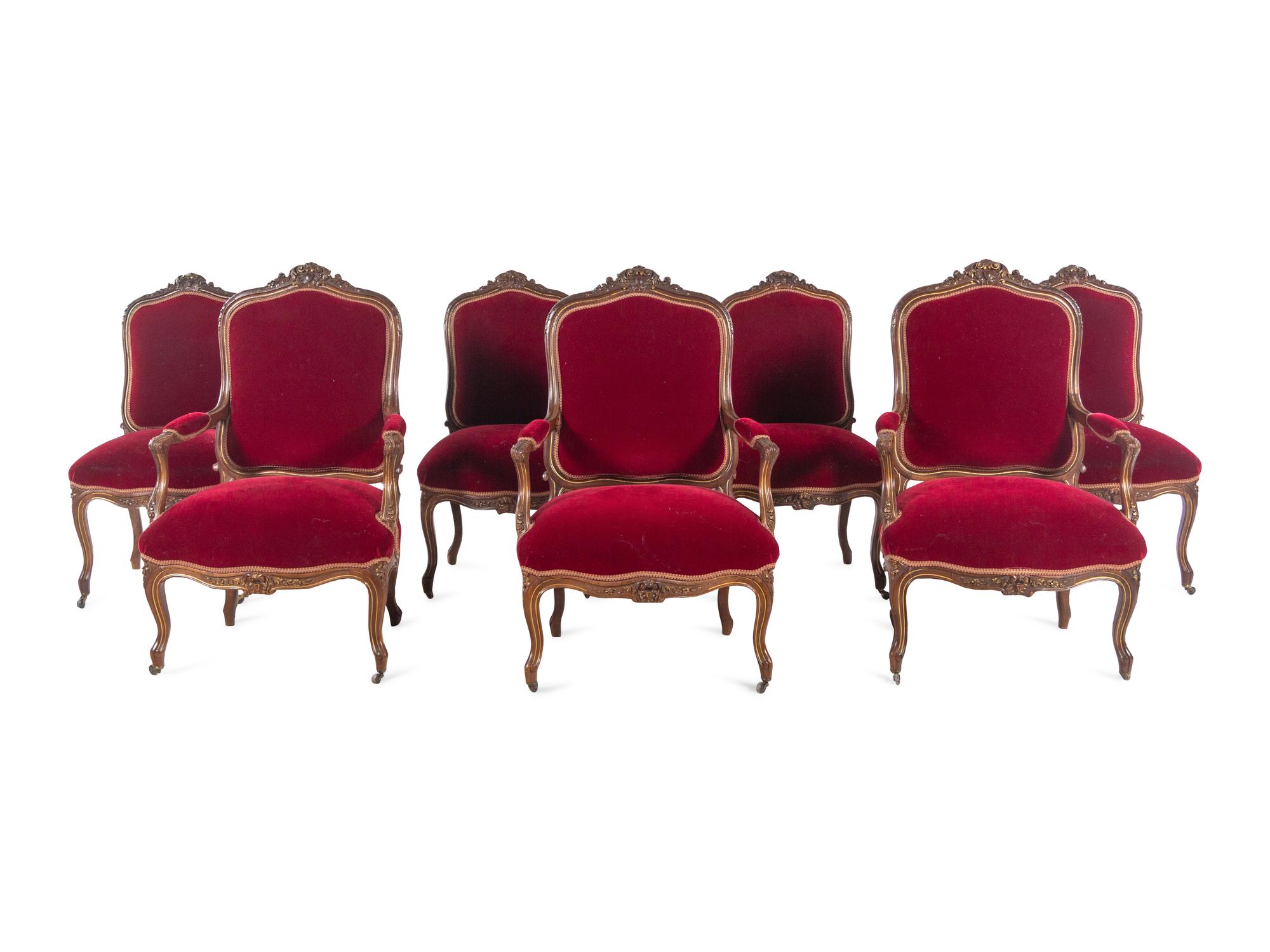 An Italian Louis XV Style Carved and Parcel Gilt Walnut Parlor Suite