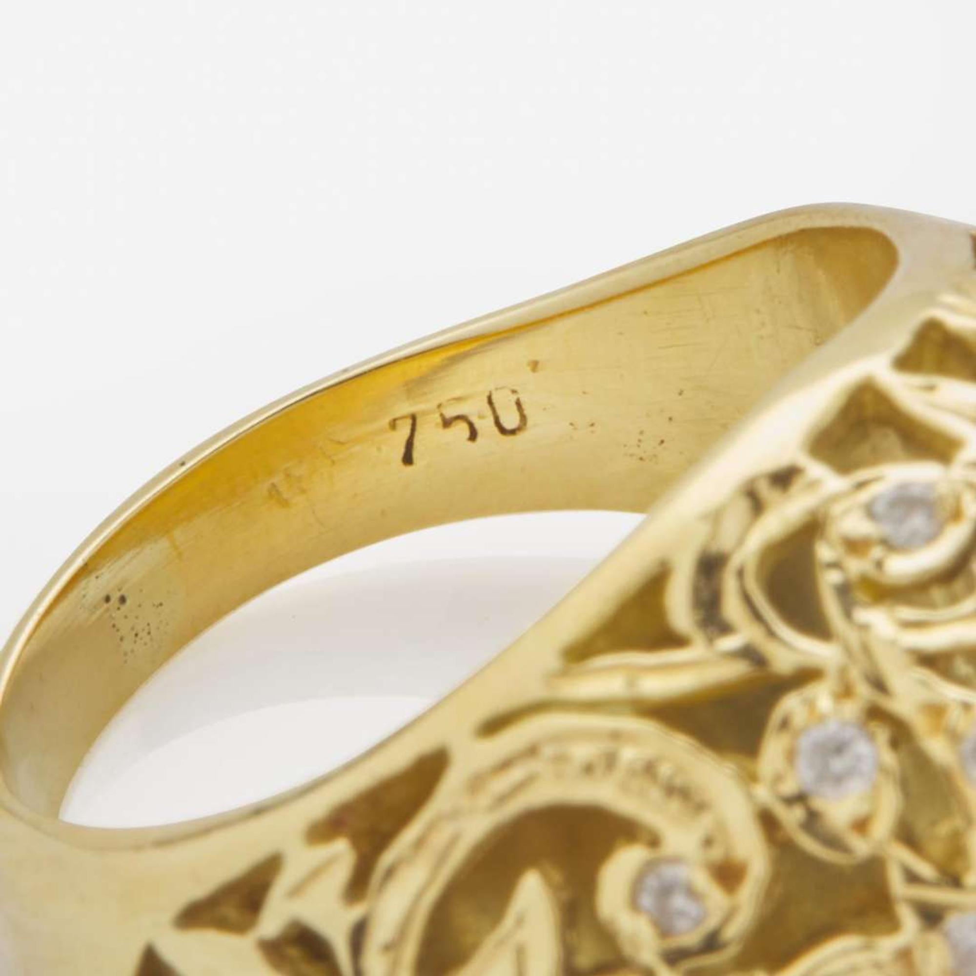 An 18K Yellow Gold and Black Diamond Ring