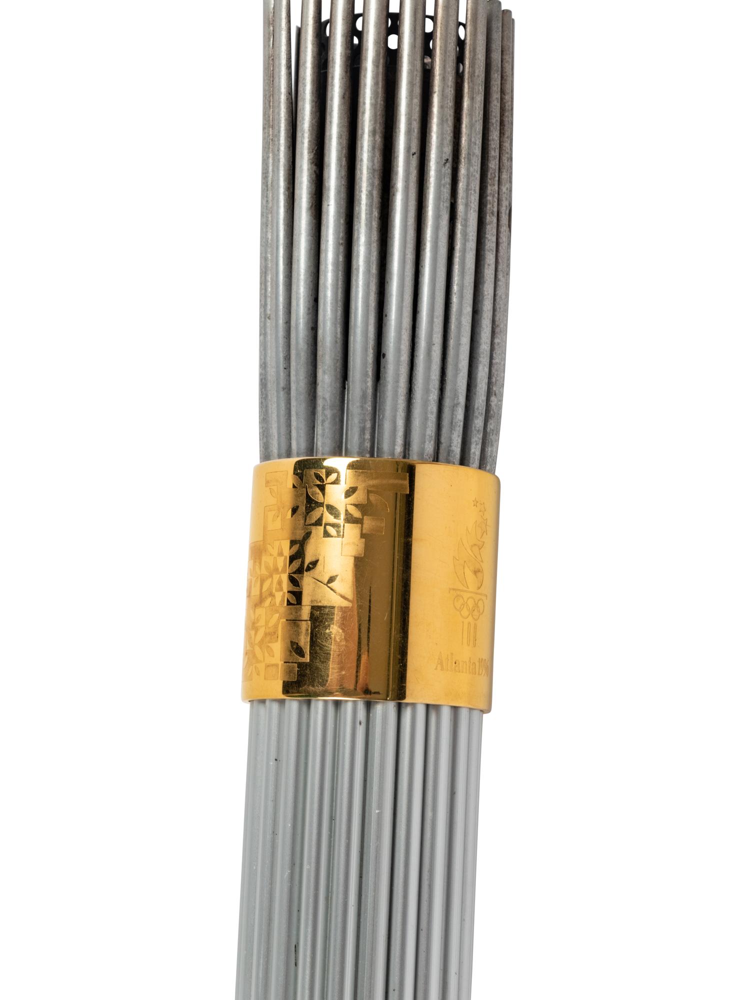 A 1996 Atlanta Olympics Torch and Assorted Relay Used Items by 1964 United States Basketball Team Gold Medal Winner George Wilson,