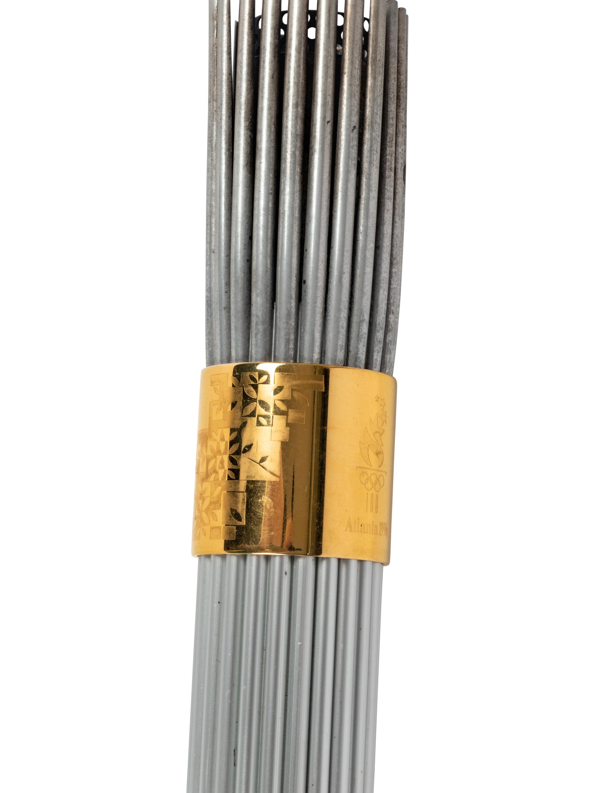 A 1996 Atlanta Olympics Torch and Assorted Relay Used Items by 1964 United States Basketball Team Gold Medal Winner George Wilson,