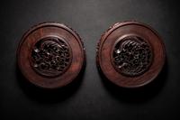 A Pair of Chinese Carved Hardwood Circular Stands