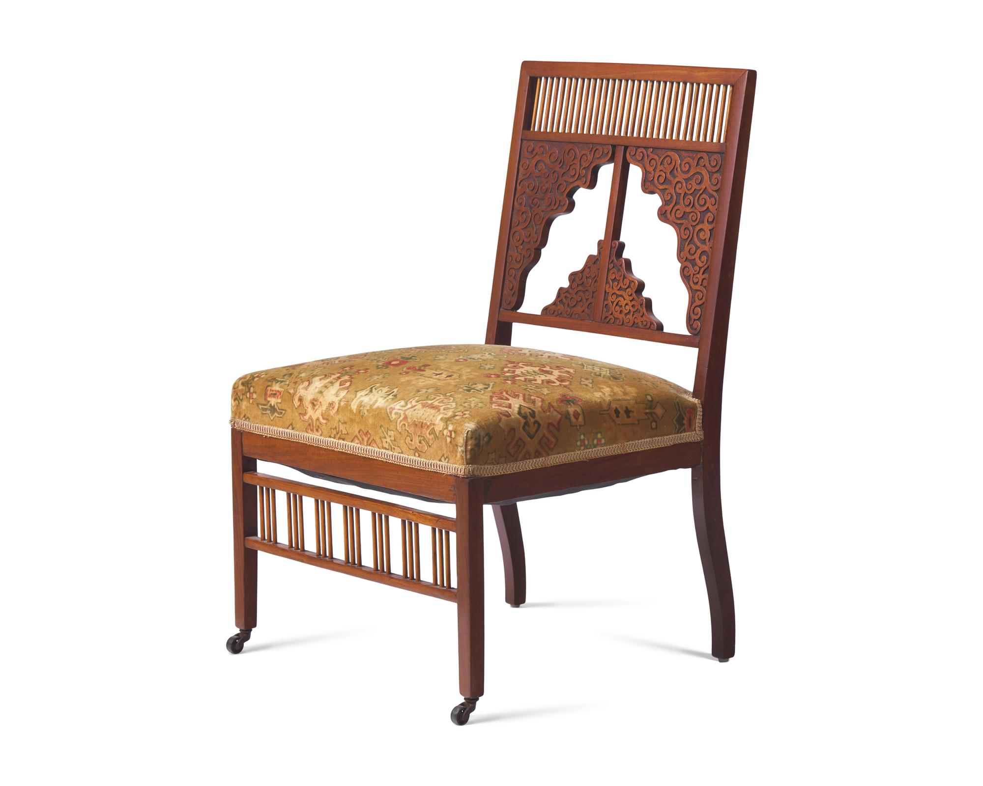 An Aesthetic Movement Carved Teak Side Chair
