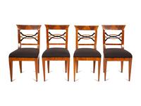 A Set of Four Biedermeier Part Ebonized Fruitwood Dining Chairs