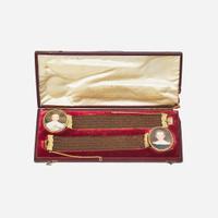 Attributed to William Egley (English, 1798-1878) A pair of hairwork bracelets with portrait miniatures of children, circa 1840
