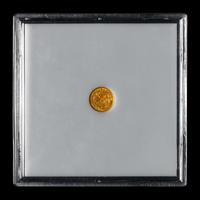 An 1853-C Liberty Head $1 Gold Coin