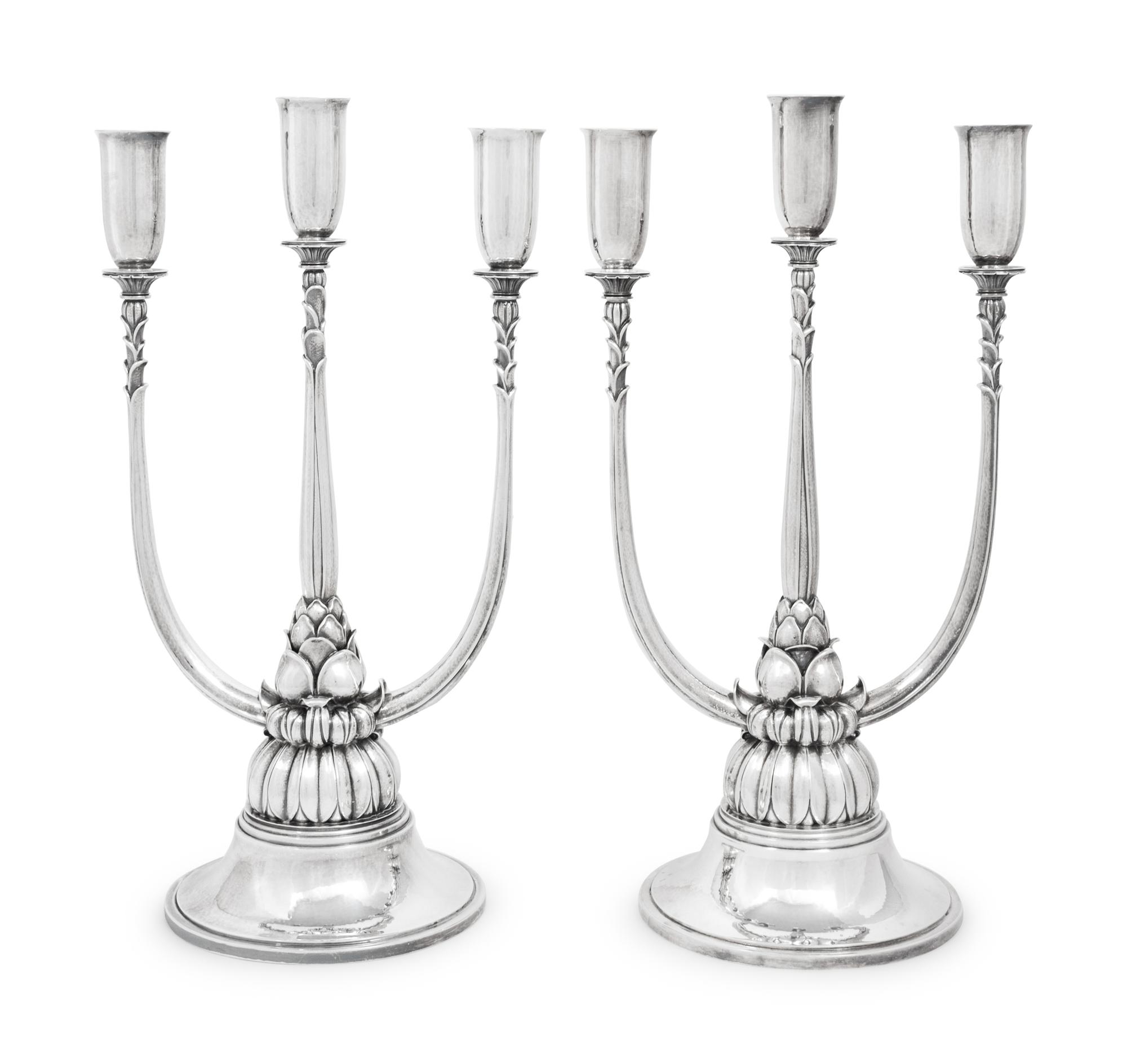 A Pair of Harald Nielsen for Georg Jensen Silver Three-Light Candelabra