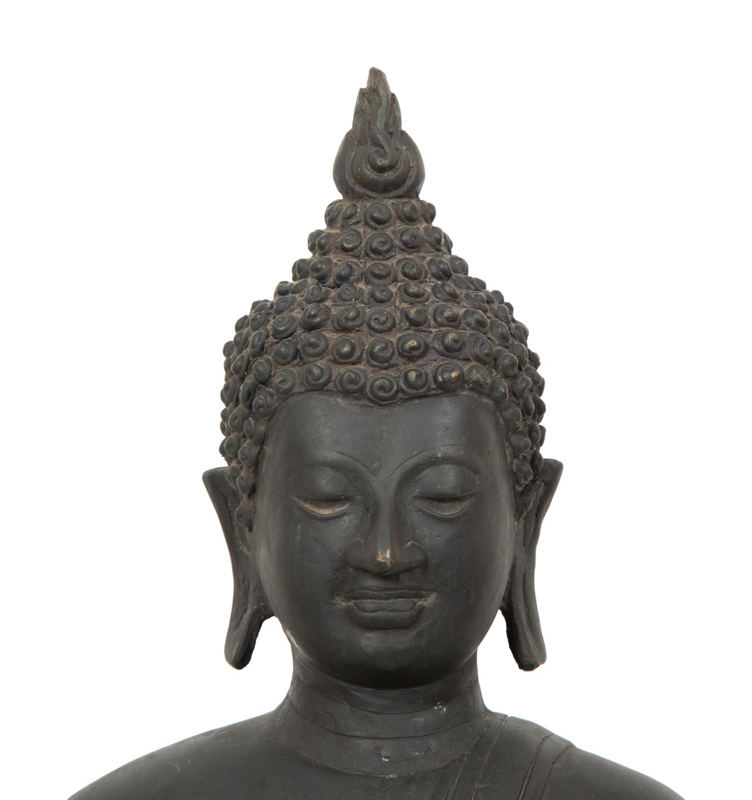 A Cambodian Bronze Figure of Seated Deity on Conforming Base